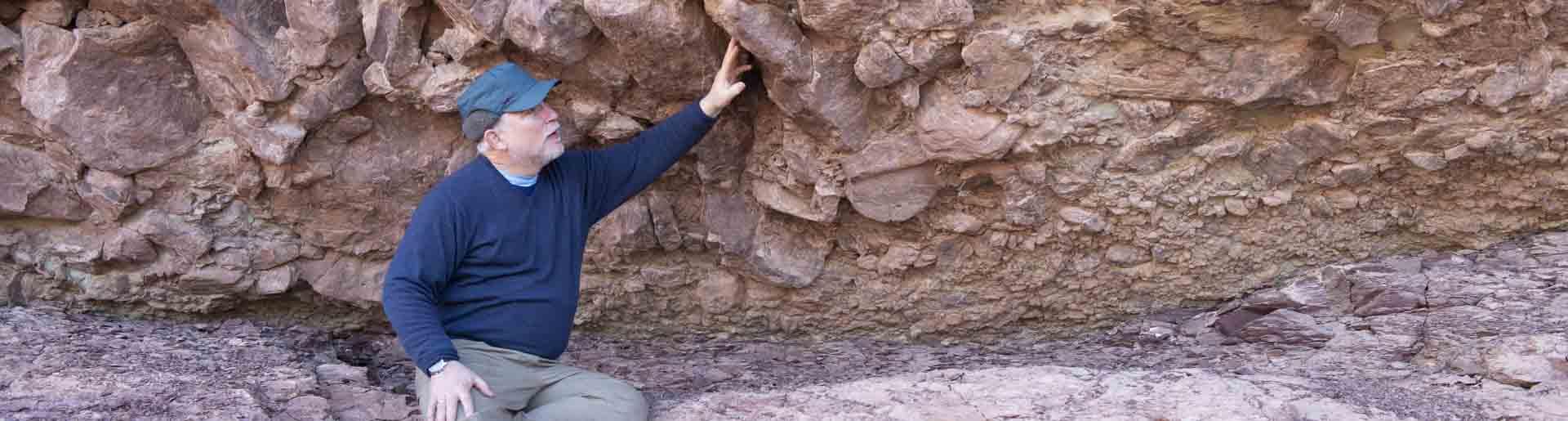 Dr. Whitmore at the Grand Canyon examining rocks.